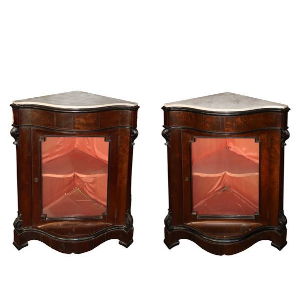 Pair of mahogany wood corner cupboards with marble on the top and central glass door