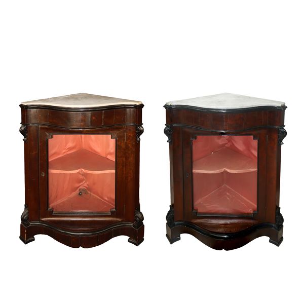 Pair of mahogany wood corner cupboards with marble on the top and central glass door