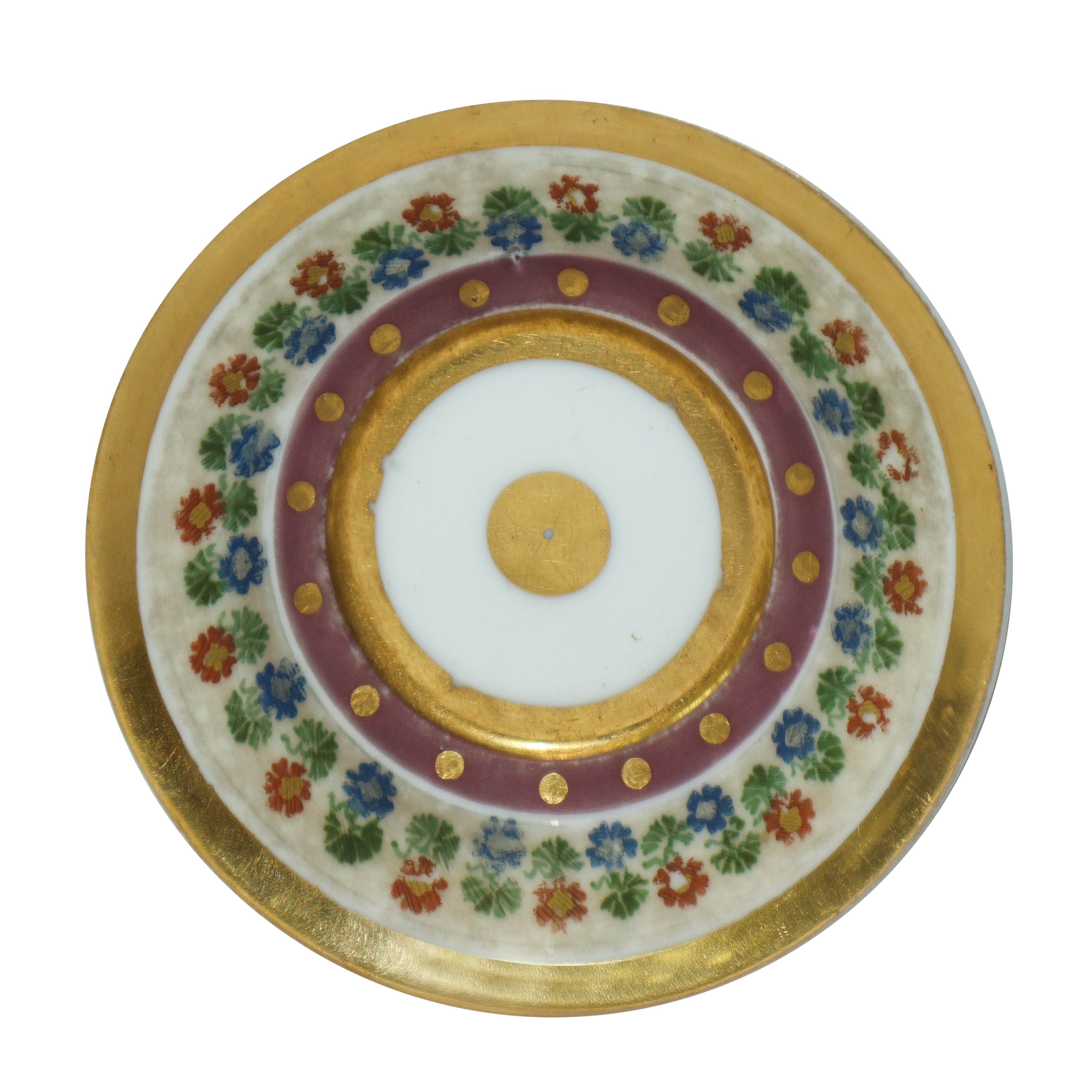 Coppia di tazzine e piattini Impero in porcellana dorata in ormolu e decori vegetali policromi