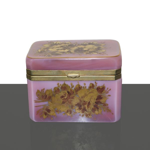 Rose quartz jewelry box decorated with golden flowers