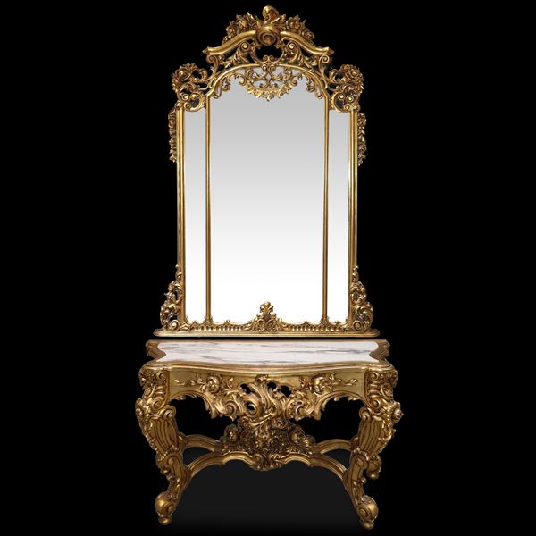 Console with mirror in the Baroque style with golden leaves 