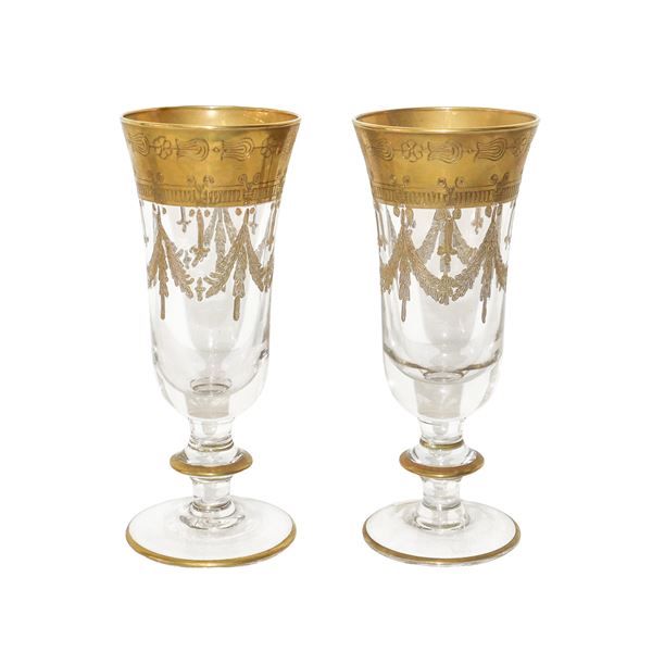 N. 2 glass champagne glasses with golden decorations