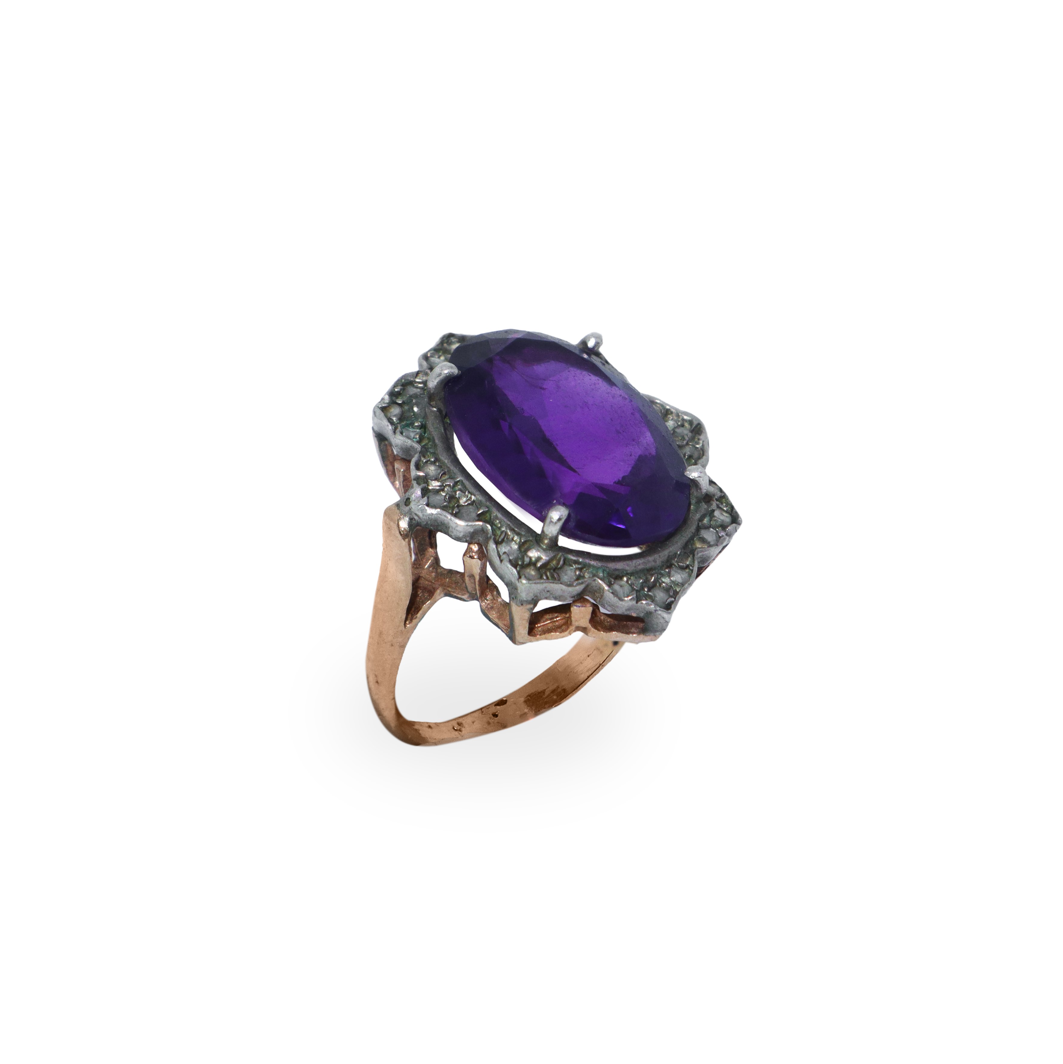 Anello in oro 14 kt e argento con ametista centrale