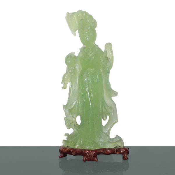 Green jade guanin with wooden base