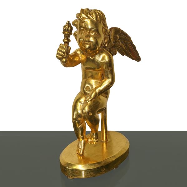 Angel with torch in hand, gilded wooden statue