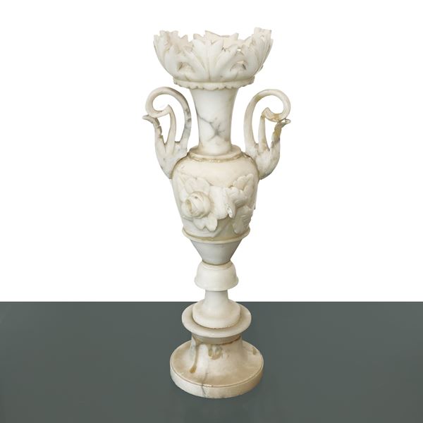 Alabaster vase with flowers in relief on the front