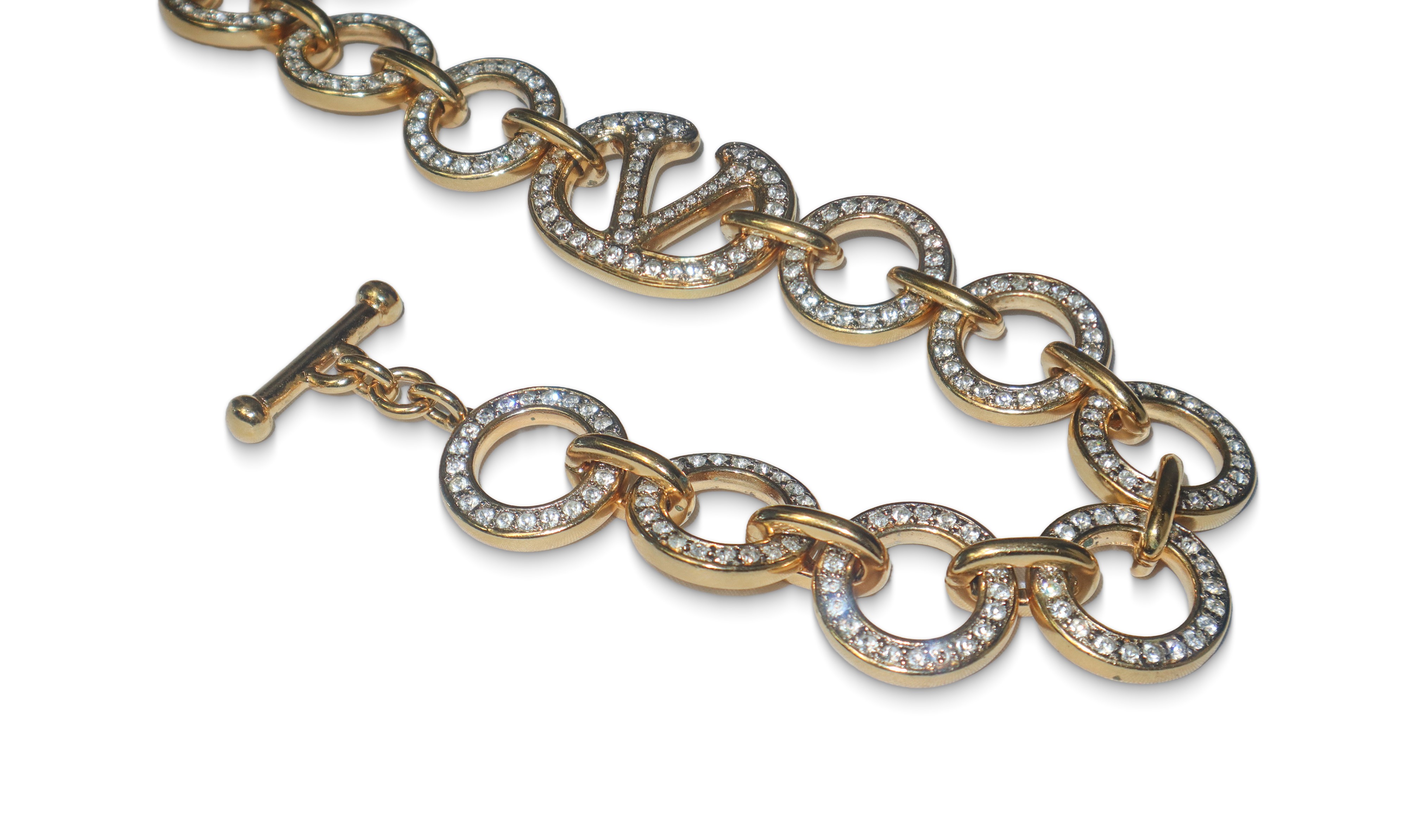 Cintura in metallo dorato Valentino con strass e logo centrale