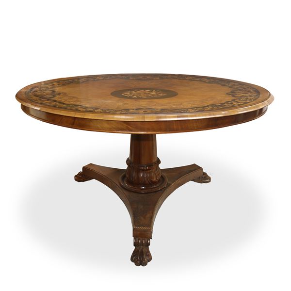 Round table with floral inlays on the top