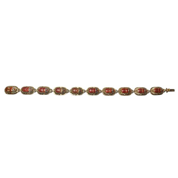 Yellow gold bracelet with red enamelled scarabs