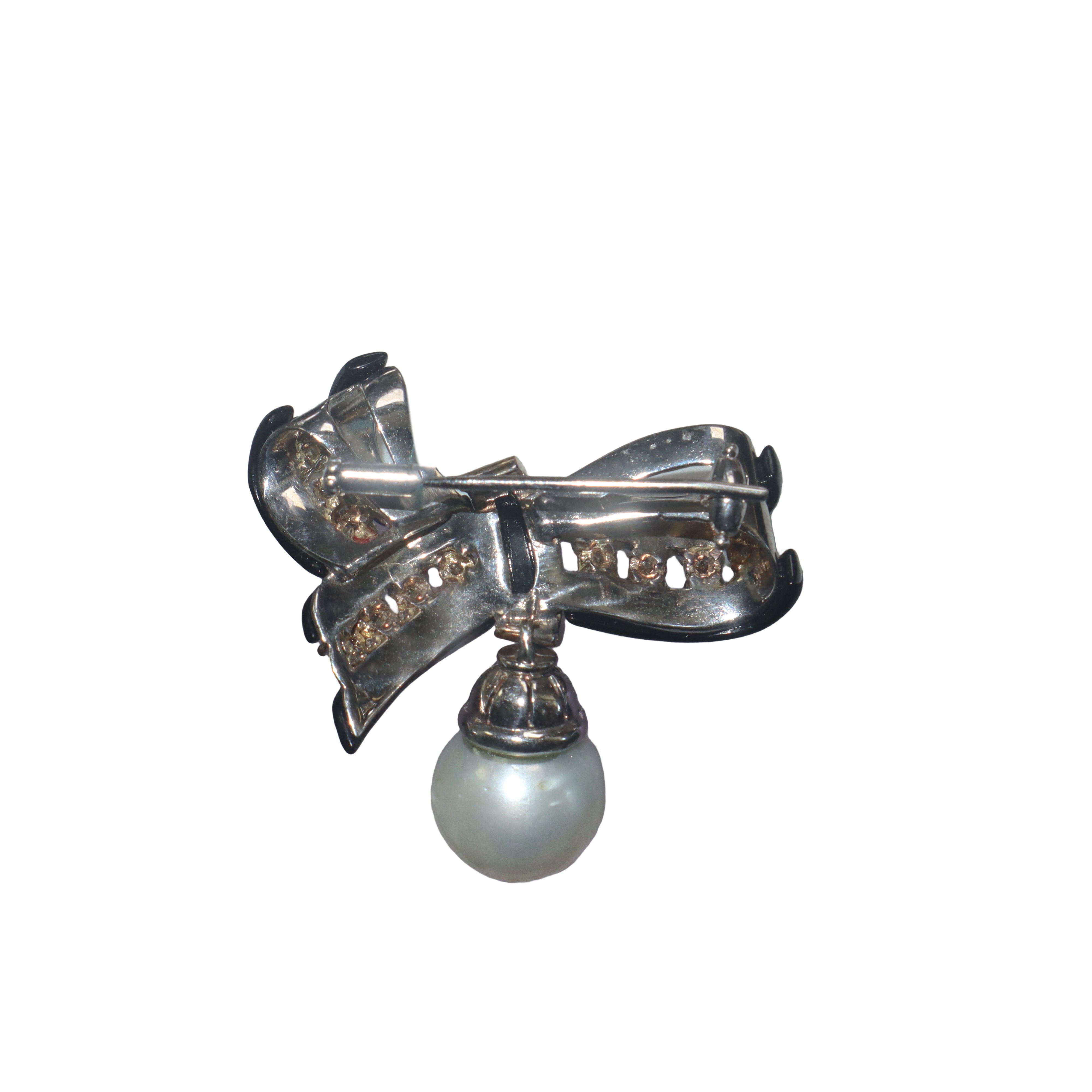 Spilla fiocco con perla pendente