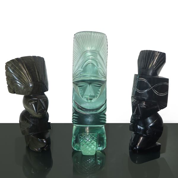 Three Aztec figures in glass obsidian