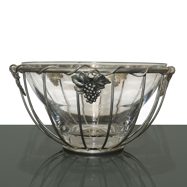 Glass cup in silver metal basket 