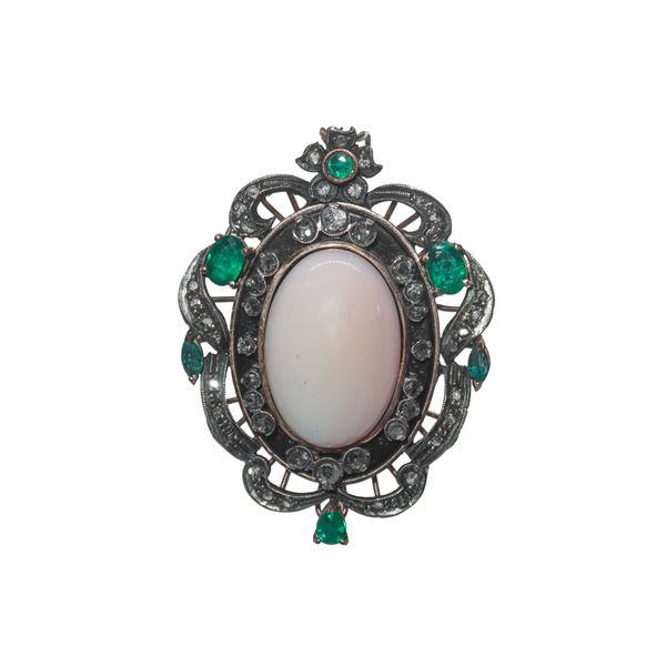 Low title gold and silver pendant with central pink coral, old-cut brilliants and emeralds