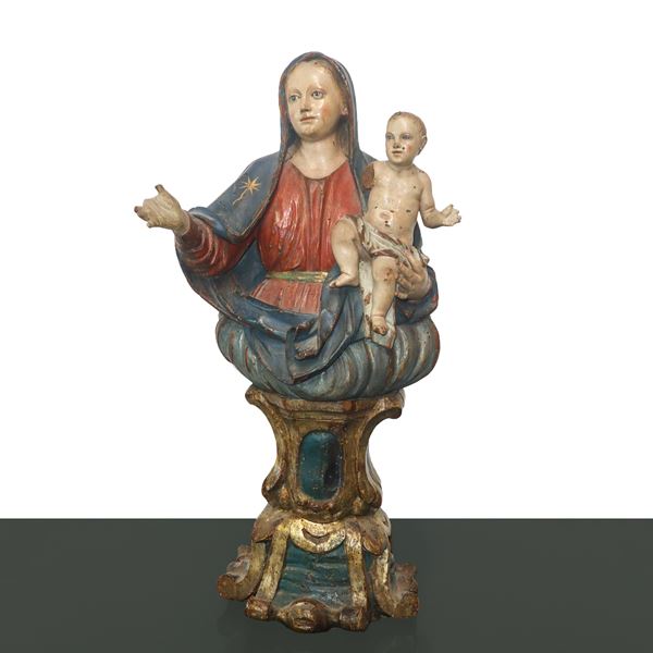 Wooden statue of Madonna with Child