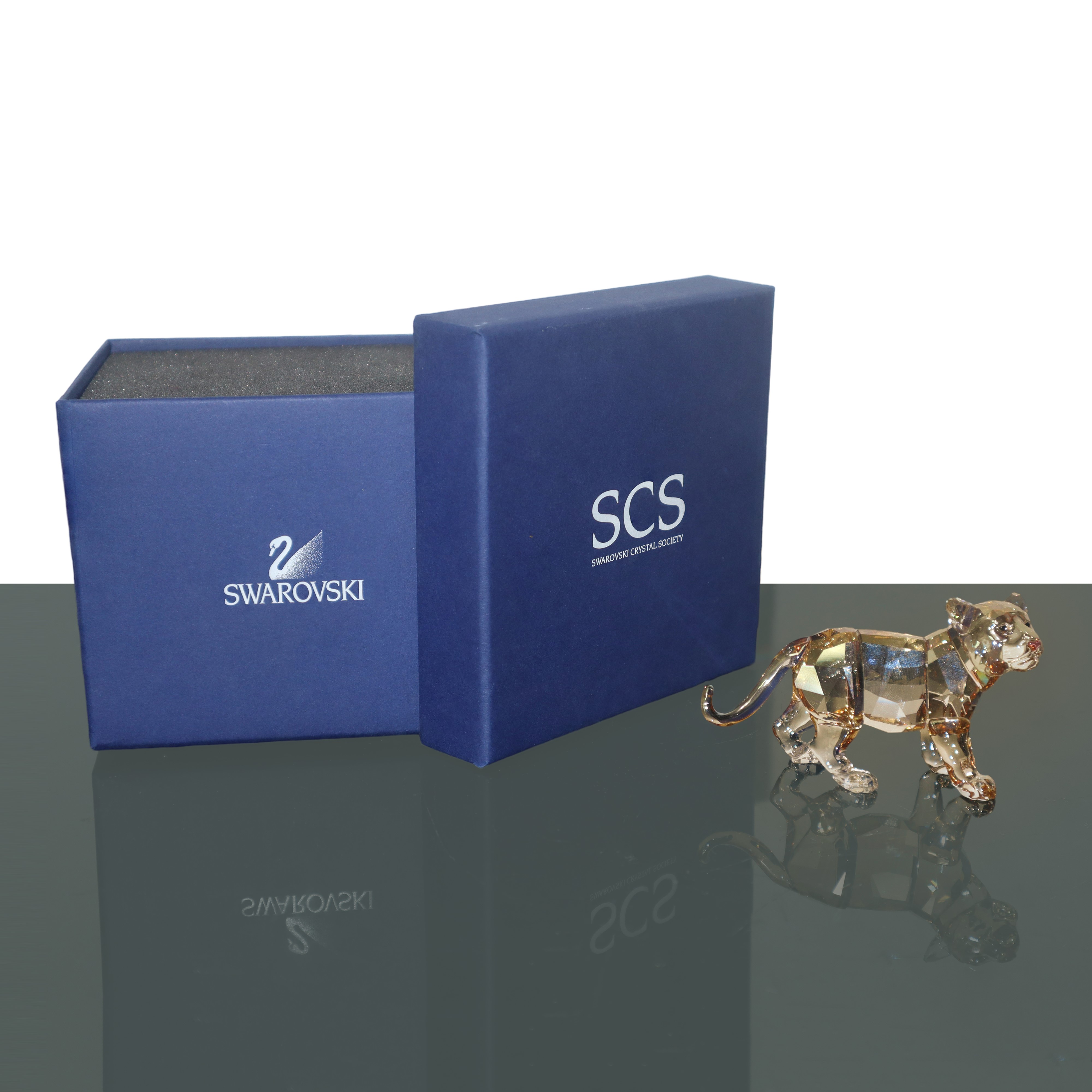 Swarovski - Cucciolo di tigre in cristallo ambrato
