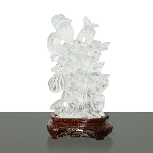 Transparent rock crystal guayin with lotus flowers in hand