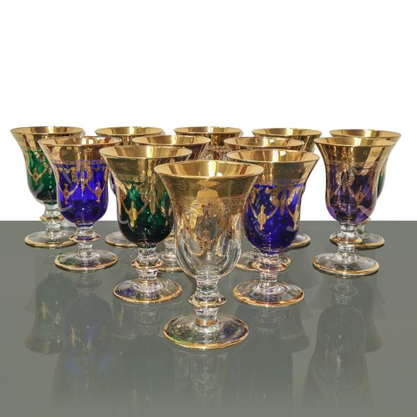 Twelve vintage golden wine glasses