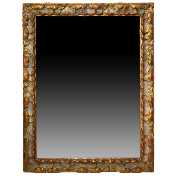 Mirror in lacquered and gilded frame