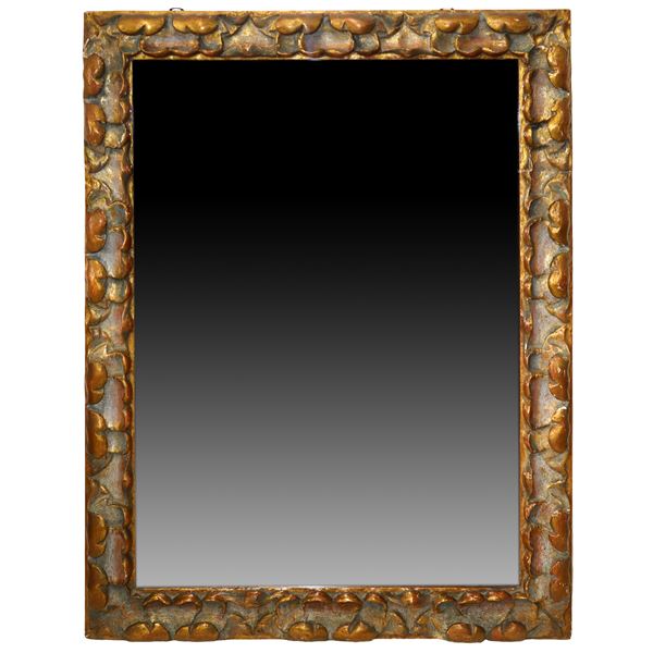 Mirror in lacquered and gilded frame