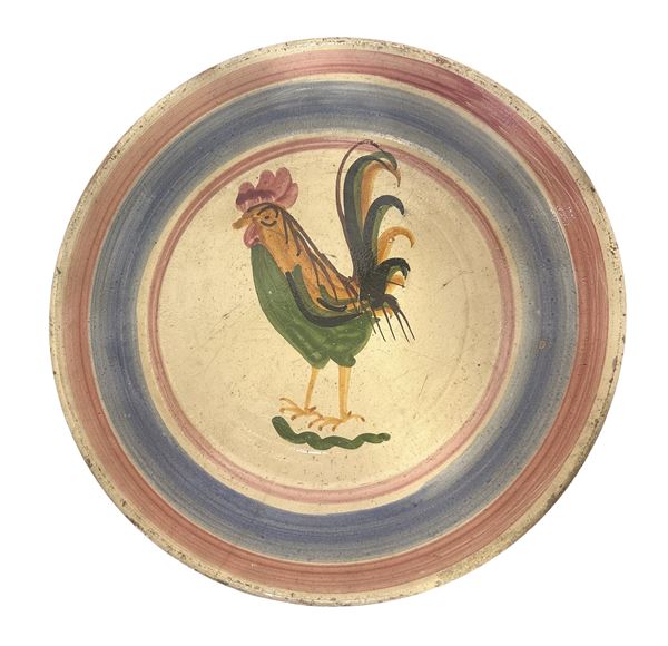 Piatto in maiolica di Patti raffigurante gallo