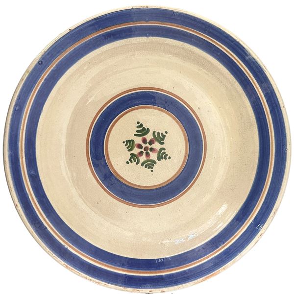 Patti&#39;s polychrome ceramic plate in shades of blue