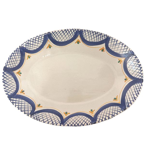 Oval plate in polychrome majolica in shades of blue