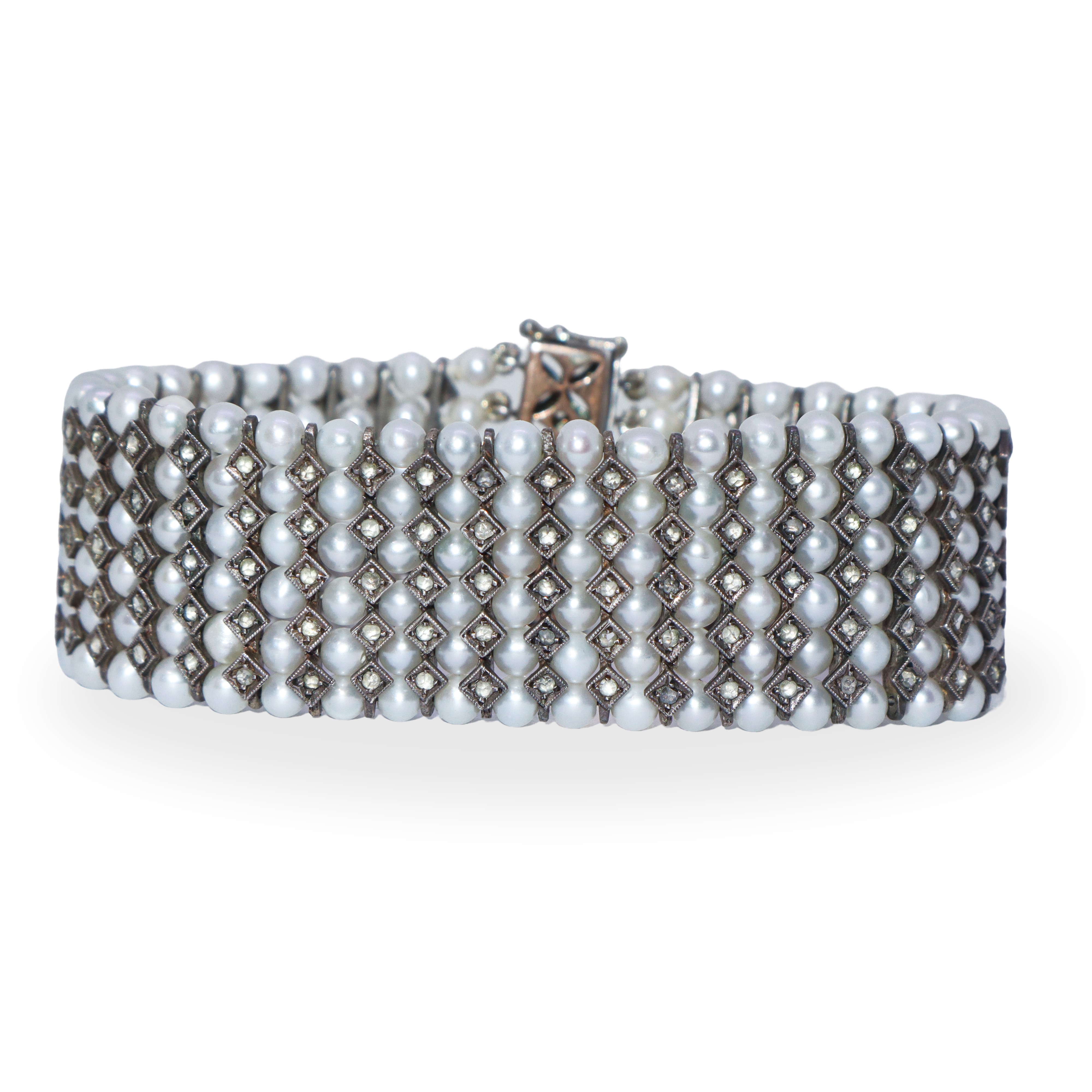 Bracciale in argento con perle e zirconi con chiusura di sicurezza