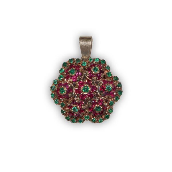Yellow gold pendant in the shape of a flower with emeralds and rubies