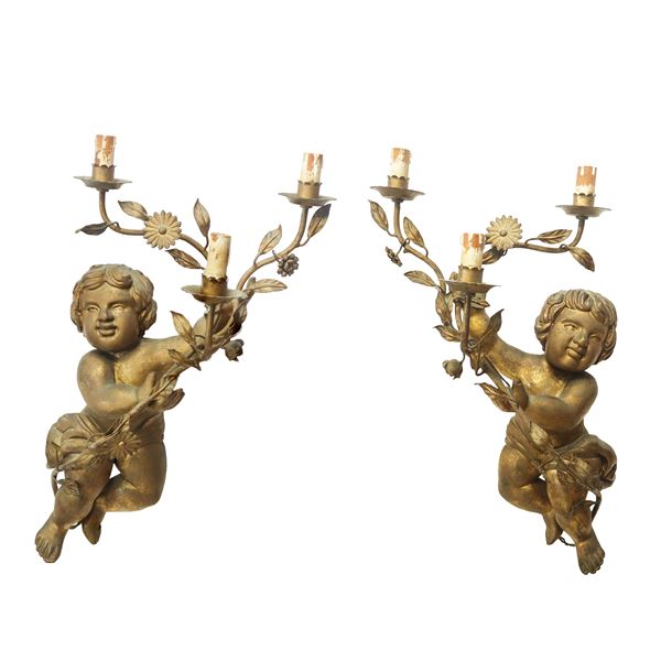 Pair of gilded wooden candle holders with three lights