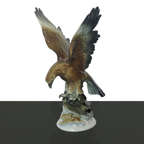 Eagle grabbing a rabbit, porcelain sculpture