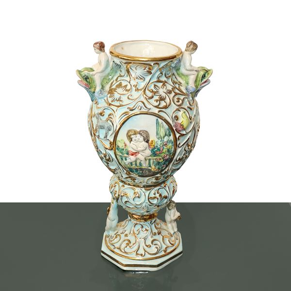 Polychrome Capodimonte porcelain vase with cherubs