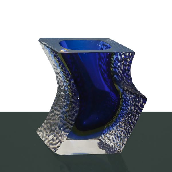 Blue submerged glass vase with internal iridescence in shades of yellow