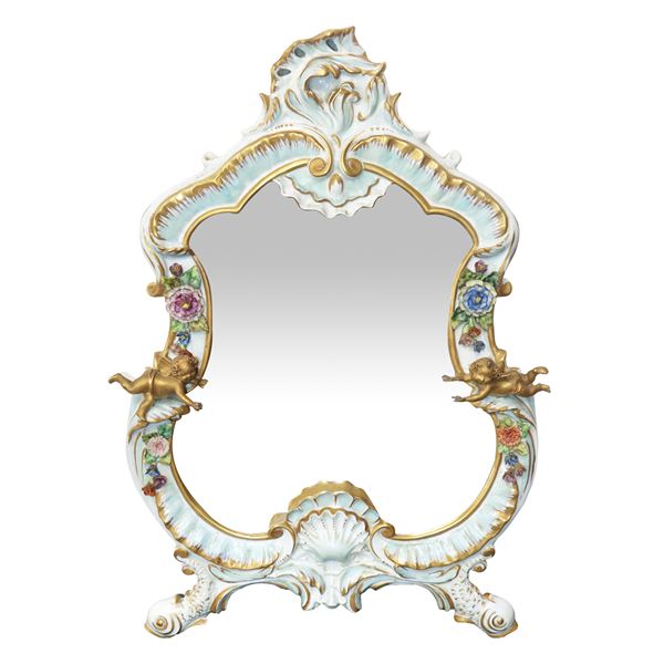 Capodimonte porcelain mirror with golden cherubs