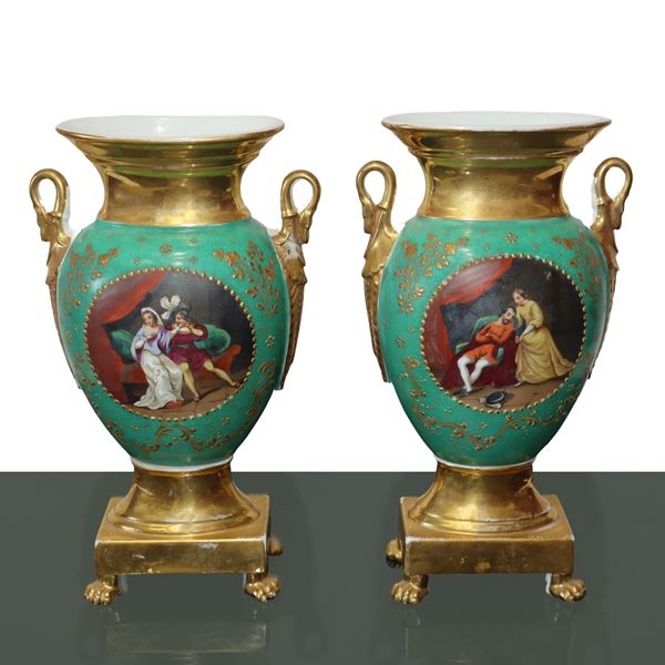 Pair of green and gilt Old French Empire vases on a gilt base with lion's feet