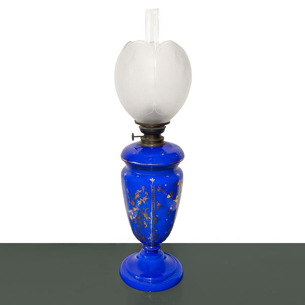 Blue porcelain oil lamp with gold leaf decorations