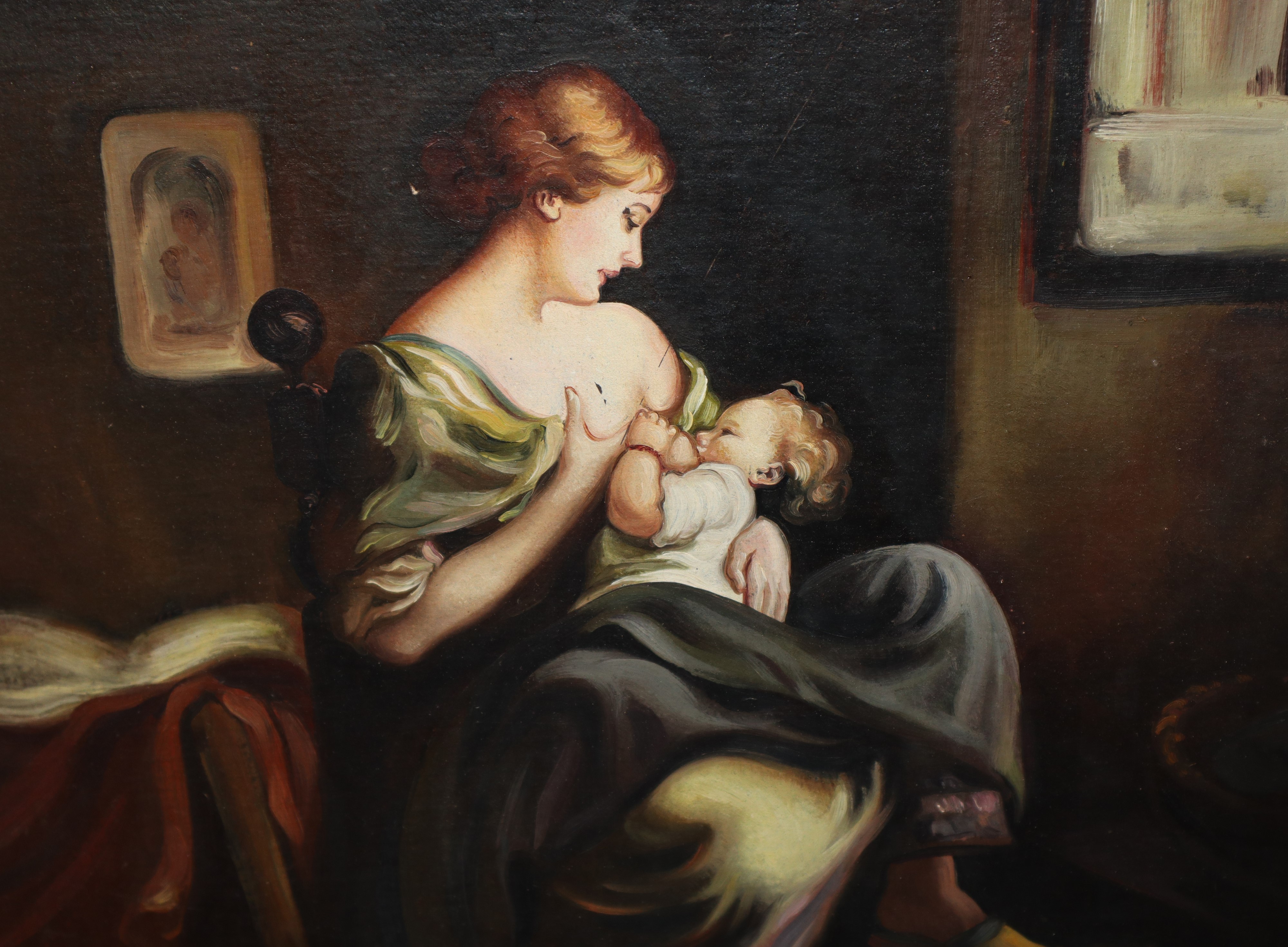 Donna che allatta il bambino