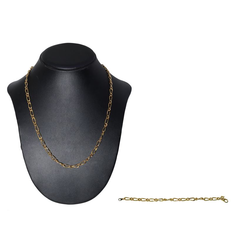 Parure composta da bracciale e collana a catenina in metallo dorato