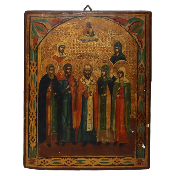 Russian icon Christ Pantocrator with seven saints on a gold background