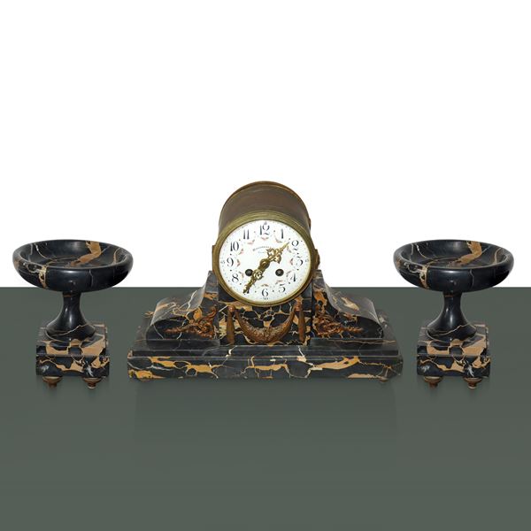 Triptych composed of a table clock and a pair of Portoro marble stands