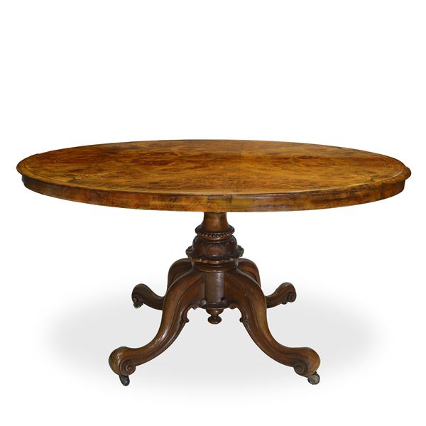 Oval table in walnut root, top inlaid in light wood, 4-spoke base