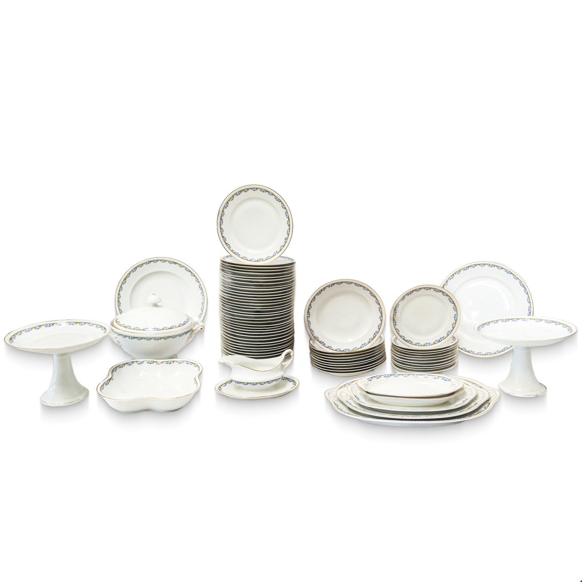 Servizio in porcellana bianca con motivi florali azzurri