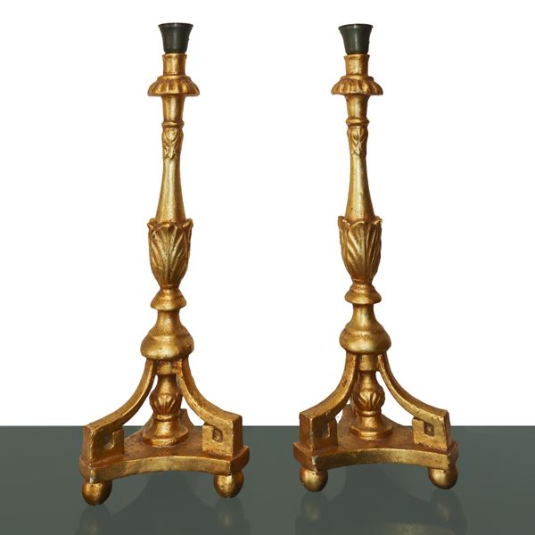 Pair of gilded wooden candlesticks