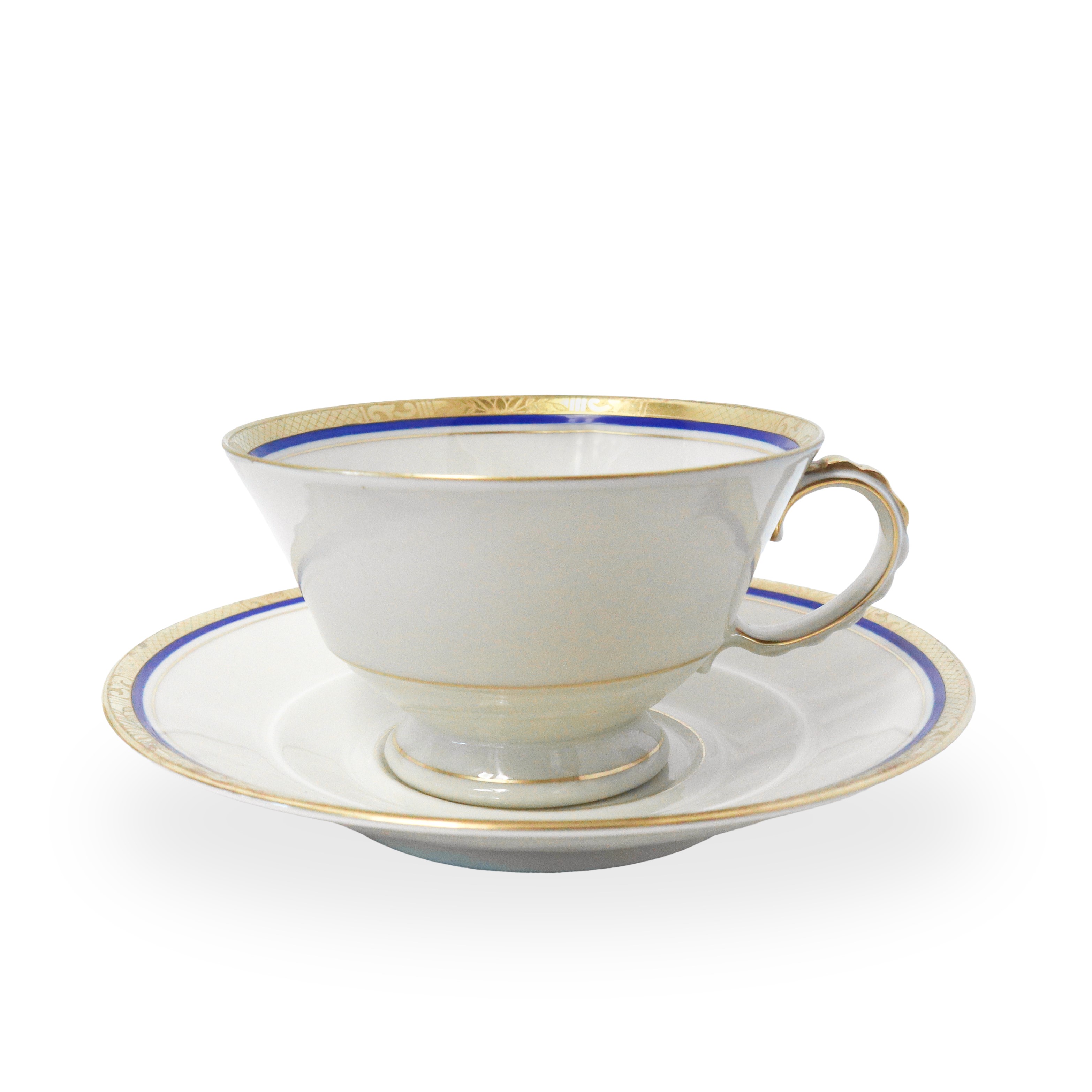 Servizio da tè in porcellana ecrù con riporti blu e dorati