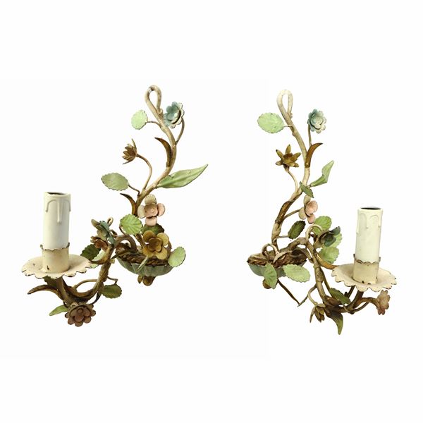 Pair of metal appliques with floral decorations