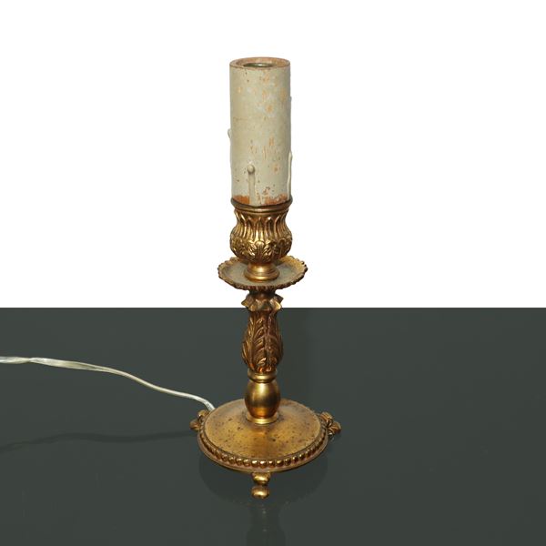 Small electrified lamp in gold metal