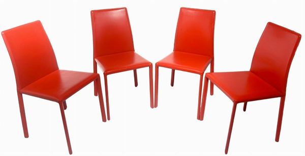 N.4 sedie con struttura in metallo, rivestita in pelle color rosso, produzione italiana.