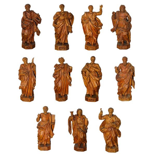 Group of 11 sculptures of apostles in hard maple wood