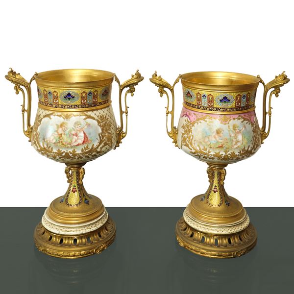 Elegant pair of Sevres porcelain vases, Napoleon III in Ormolu gilt metal with Champleve enamels