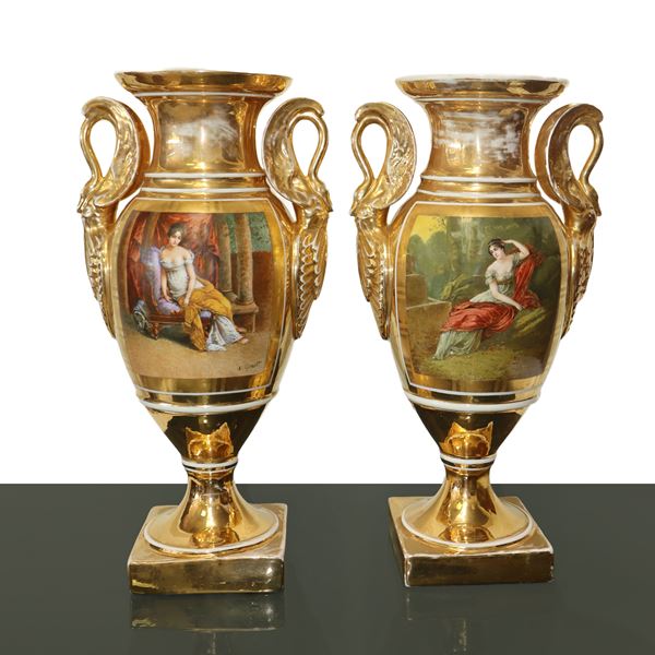 Pair of Empire vases in painted and gilded porcelain with ormolou.