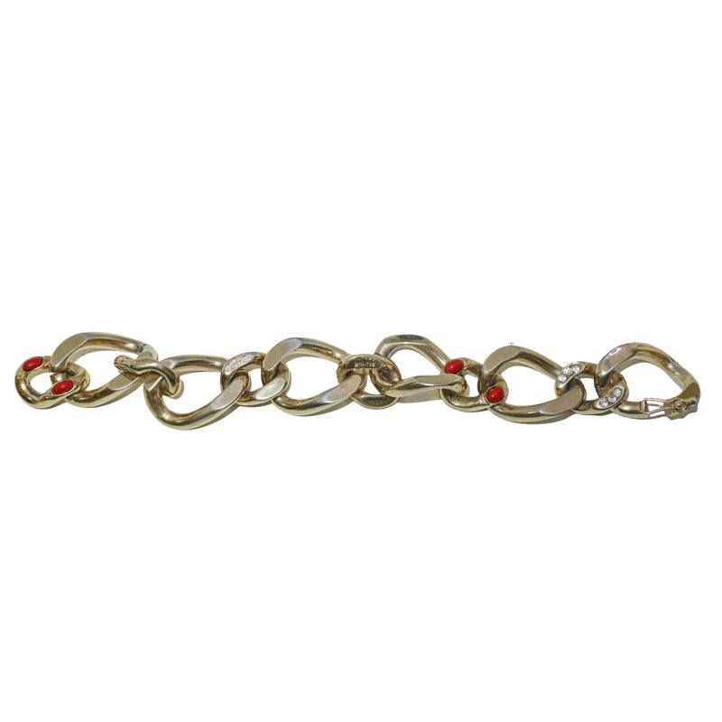 Bracciale a catena dorata con pietre rosse e strass